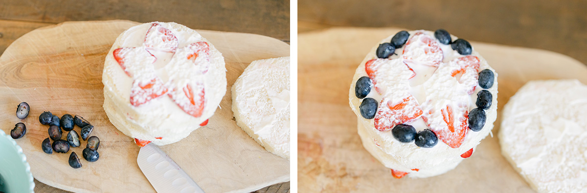 cake with slices strawberries and blueberries