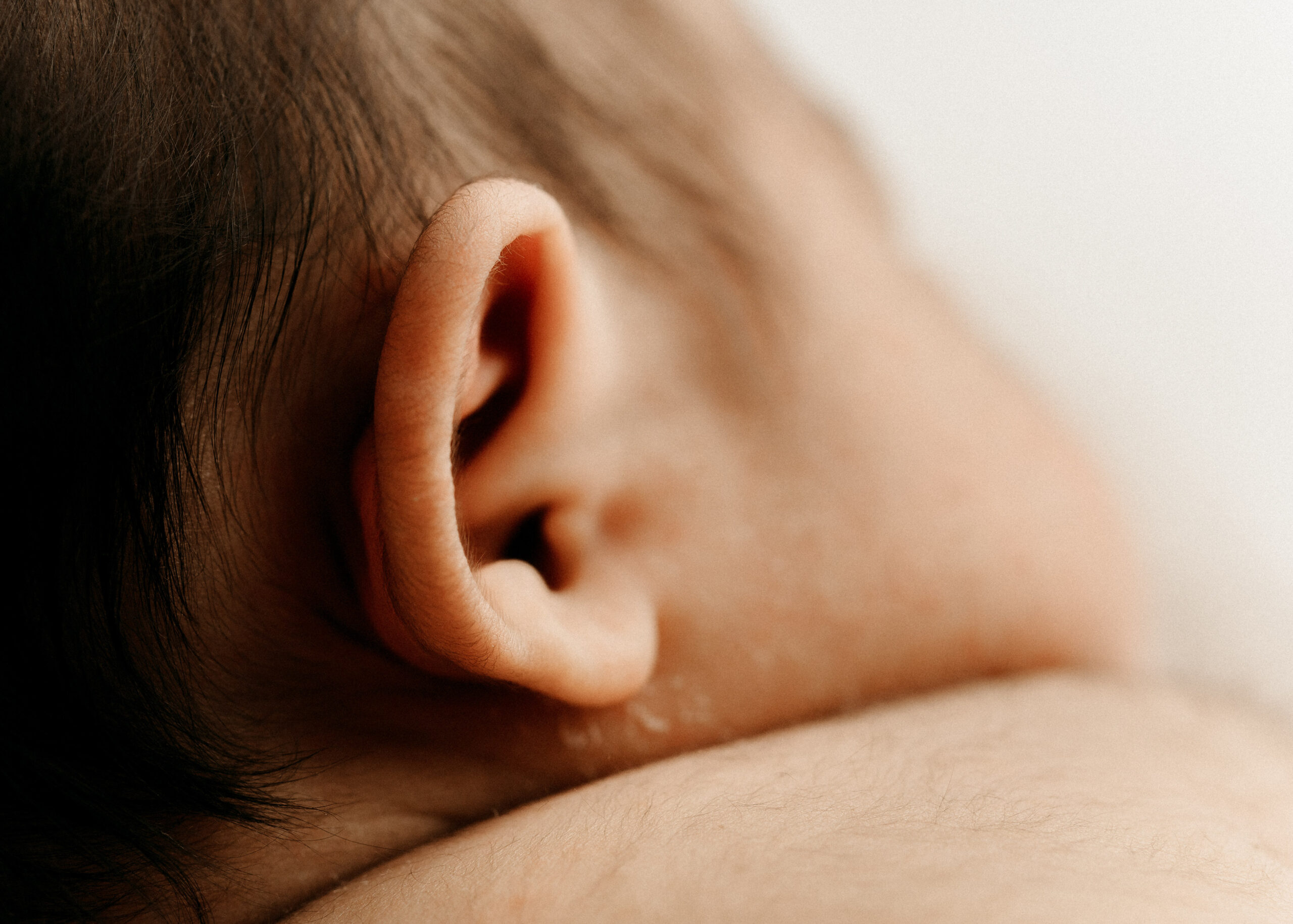 newborn baby ear macro photo